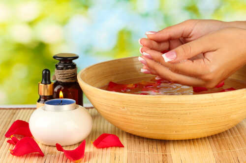 spa treatments for female hands,  on green background